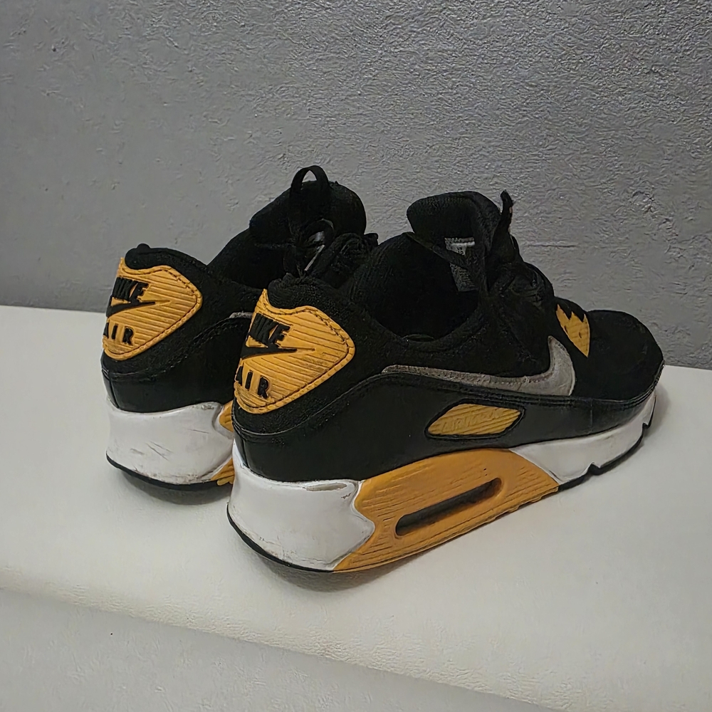 Nike Black and Gold Sneakers